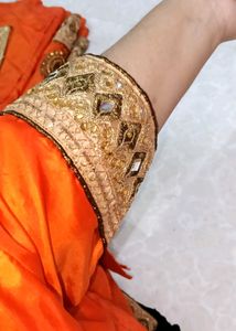 Vibrant Orange Embellished Lehenga Choli