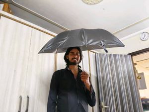 Men's White Kurta and with 1 black umbrella