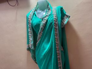 Stunning pear handwork Saree
