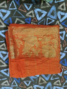 Vibrant Orange Saree with Gold Border