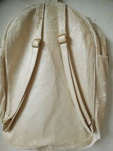 Quilted Backpack with Embellishments