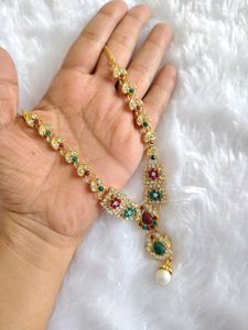 Elegant Gold Necklace with Red &amp; Green Stones