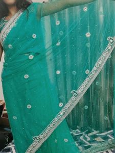 Elegant Teal Saree with Embellishments