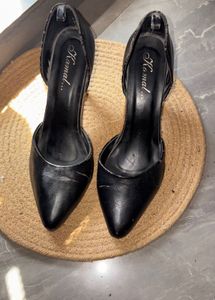 Black pointed toe stiletto pumps