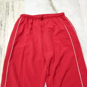 Red Athletic Pants with White Stripes