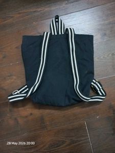 Stylish Black Backpack with Tassel