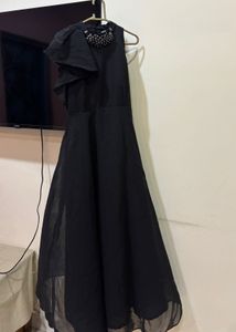 Chic Black Dress with Embellished Neckline