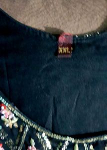 Beautiful embroidered Naira suit
