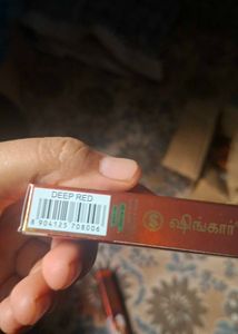 it is maroon and deep red shringar bindi stick