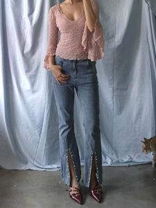 Flared Jeans with Studded Slits