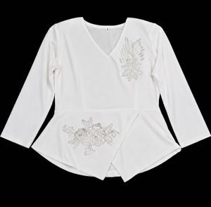 White Embroidered Peplum Blouse