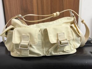 Cream/ white shoulder bag with pockets