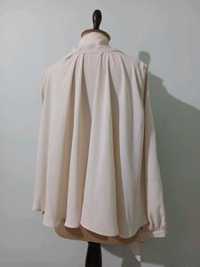 Elegant Sheer Blouse with Bow Detail