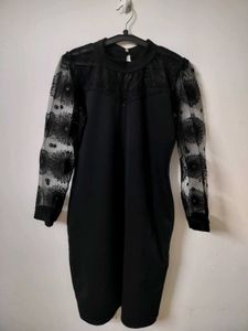 Elegant Black Dress with Sheer Embellished Sleeves