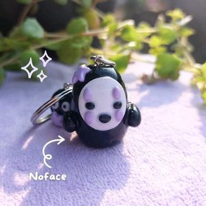 COMBO : Kawaii No Face Keychain + FREEBIE