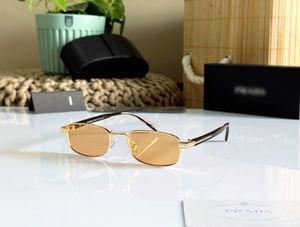 Prada Sunglasses - Gold &amp; Black
