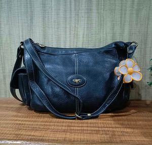 Chic Navy Leather Shoulder Bag with Flower Accent