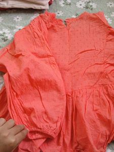Coral Smocked Peplum Top