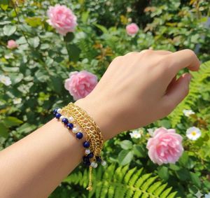 Elegant Gold Bracelet with Blue & Pearl Beads