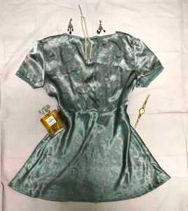 Silky teal fey top with lace trim