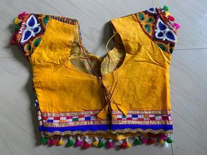 Vibrant Yellow &amp; Blue Embroidered Lehenga Choli