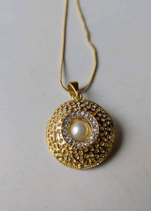 Elegant Gold Tone Pendant