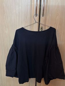 Stylish Black Top with Dramatic Sleeves