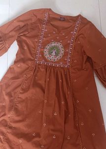 Orange Kurta with Peacock Embroidery