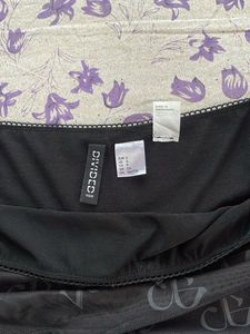 Black Printed Mesh Mini Skirt
