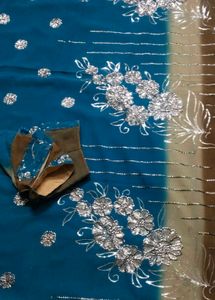 Stunning Teal Blue Saree with Silver Embellishment