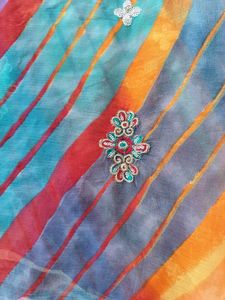 Vibrant Striped Saree with Embellishments