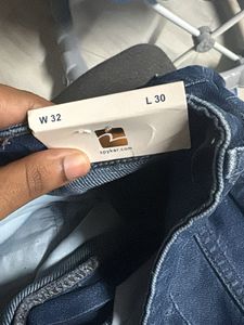 Distressed Blue Denim Jeans