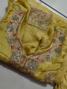 Elegant Yellow Kurta Set with Intricate Embroidery