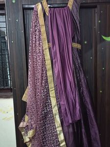 beautiful purple color heavy gown with bottom and dupatta