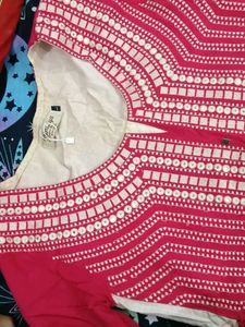 Elegant Pink Kurta Set with Intricate Embroidery