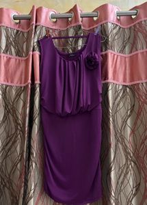 Elegant Purple Ruched Dress with Floral Accent