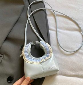 Chic Pastel Blue Ruffled Handbag
