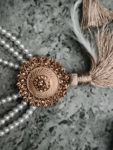 Elegant Pearl Necklace with Tassels