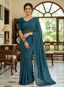 Elegant Teal Saree with Intricate White Pattern 3