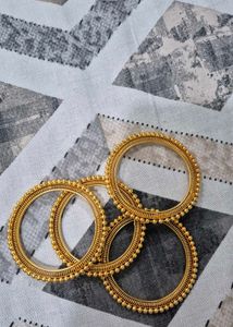 Set of 4 Gold Tone Bangles