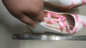 Chic White Heels with Pink Ribbon Detail