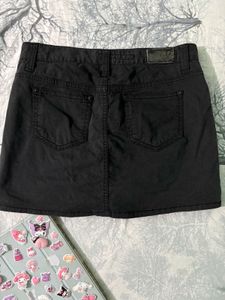 Chic Black Skirt with Patches