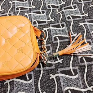 Orange Quilted Crossbody Bag