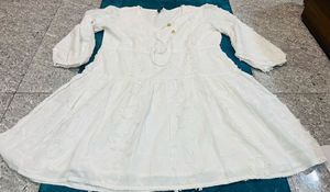 Elegant White dress with Intricate Detailing