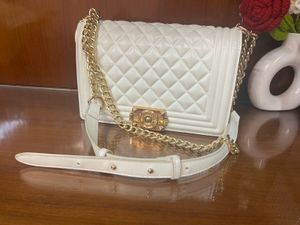 Chic Quilted White Handbag with Gold Chain