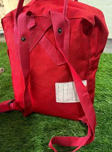 Kanken Fjallraven red backpack