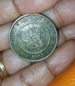 Rare Coin United States (USA) Arcade Token - Chuck E Cheese with letter "C" on the hat 2005 Where A Kid Can Be A Kid