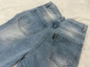 washed out distressed Blue baggy Jeans
