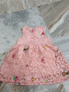 Adorable Pink Lace Dress with Butterfly Motifs
