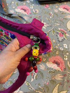 Embroidered Hobo Bag with Tassels